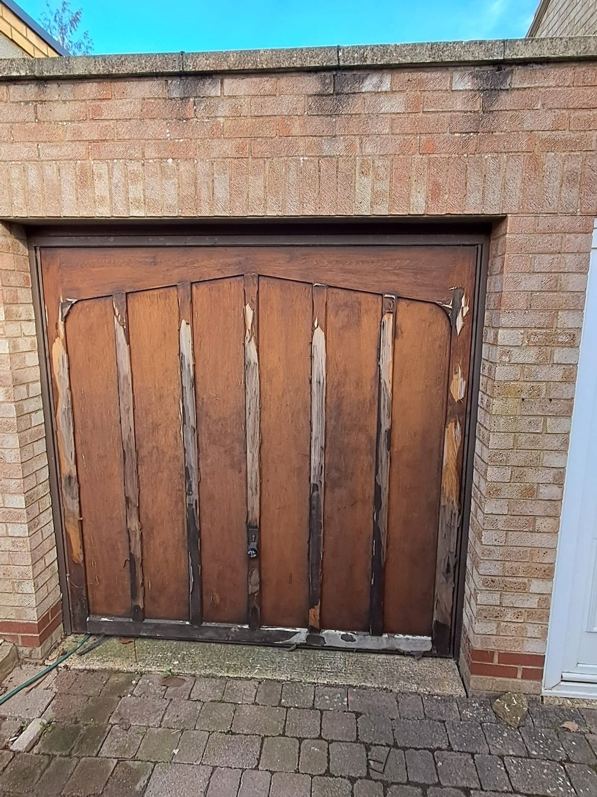 Before_-__replacement_insulated_sectional_garage_door_in_anthracite_grey_M_ribbed._Electricaly_operated.