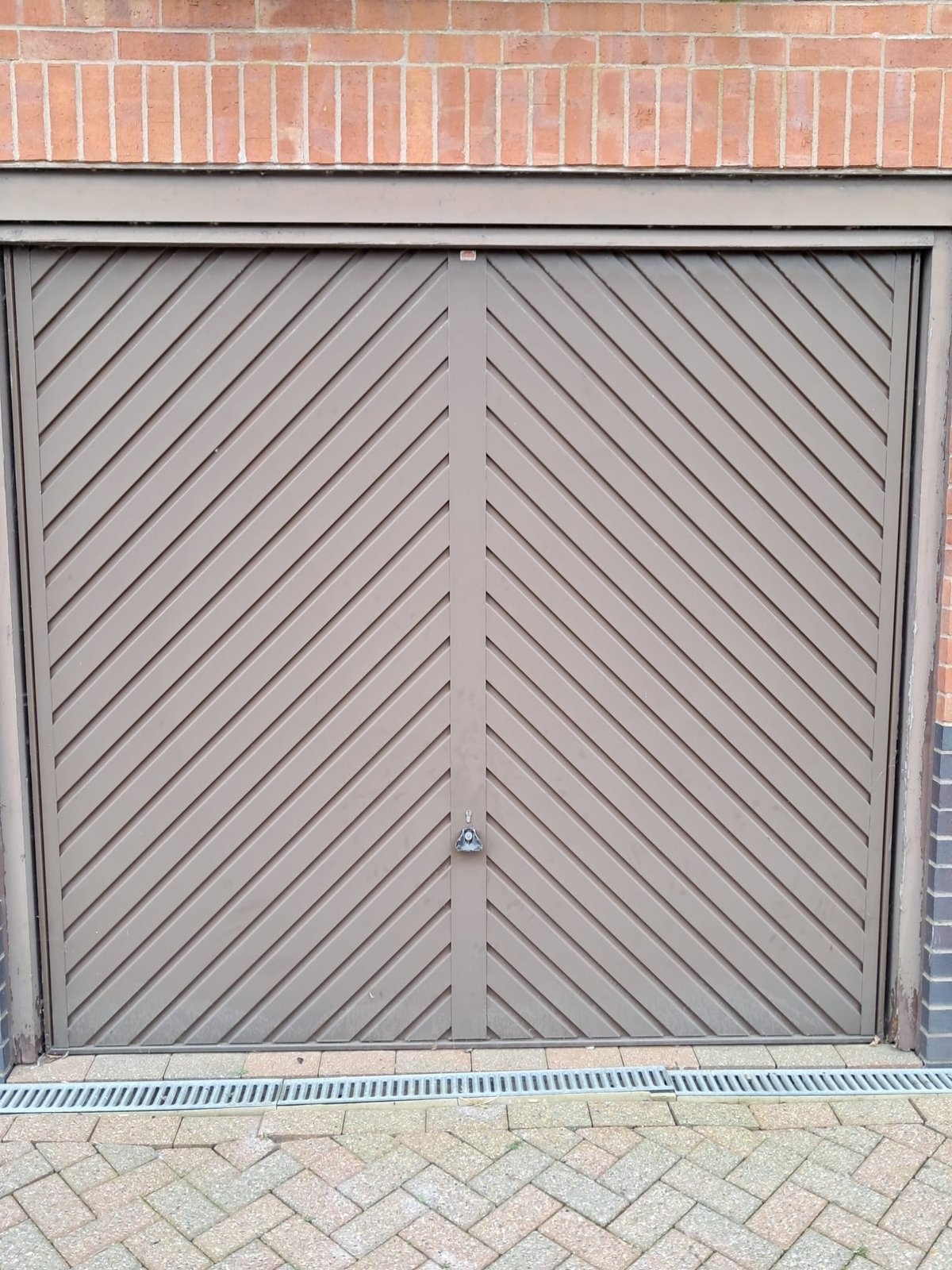 Before_-_replaced_with_M-rib_sectional_garage_door_in_Rosewood_with_electric_operation.